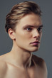 © Vasyl - Handsome man on grey background
