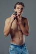 © Vasyl - Handsome man on grey background