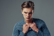© Vasyl - Handsome man on grey background