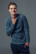 © Vasyl - Handsome man on grey background