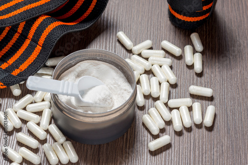Fotografia Sports supplements for bodybuilding. Protein, bcaa, capsules