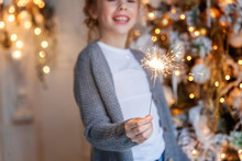 Young Girl With Christmas Sparkler