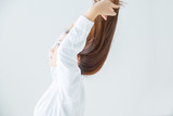 Fototapeta  - 髪をかき上げる女性
