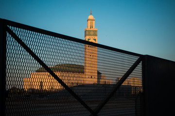 View of Hassan II mosque behind fences from a construction site - Casablanca - Morocco