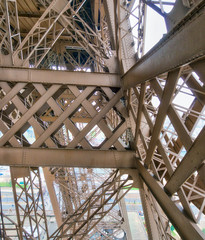Fototapete - Internal metallic structure of Eiffel Tower in Paris - France
