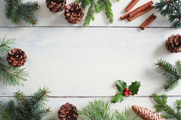 Christmas background with Christmas decorations on wooden white table.