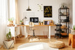 © Photographee.eu - Stylish home office with pouf