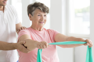 Poster - Senior woman during individual rehabilitation