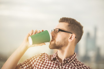 Poster - Attractive businessman drinking coffee