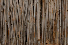 Dry Cane And Clay Texture Of A Mud Hut Of A Structure Brown Close Up