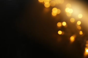 Wall Mural - abstract bokeh background of golden light burst.