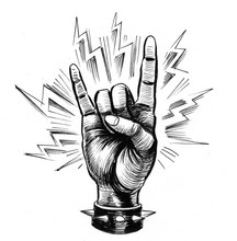 Hand Showing A Rock Sign