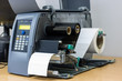 © kaweewat - Sticker label printer. Barcode digital printer