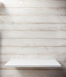 white shelf on wooden wall background