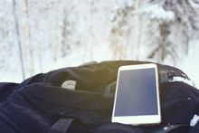 Mobile Phone On The Backpack 