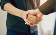 © sitthiphong - Joint Hands of Two Businessmen After Negotiating a Successful Business Agreement, And the handshake together. This is to promote cooperation in the joint business. Teamwork planning