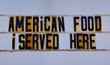 © StockPhotoAstur - Retro american food sign on route 66.