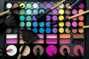 Wall Mural - Professional makeup tools with eyeshadow palette