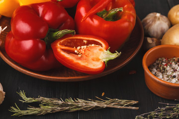 Wall Mural - Fresh bell pepper on wooden background