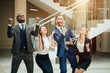 © alfa27 - Business team celebrating a triumph with arms up