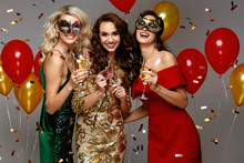 New Year Celebration. Beautiful Girls In Dresses At Party