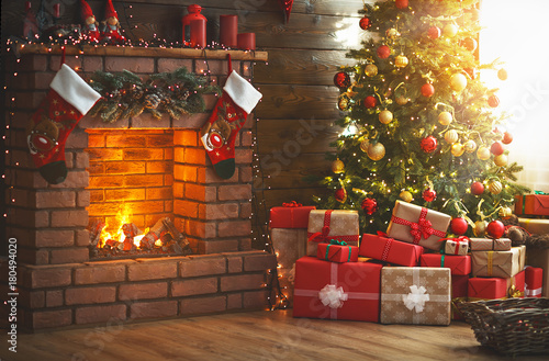 Fotografia, Obraz interior christmas. magic glowing tree, fireplace, gifts