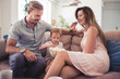 © ivanko80 - Happy family with a child at home.