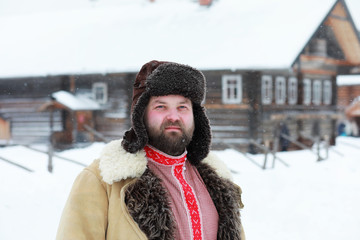 Wall Mural - Traditional winter costume of peasant medieval age in russia