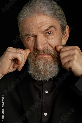 Wrinkled Old Man Holding Fists Close To Face Aged Male With Long