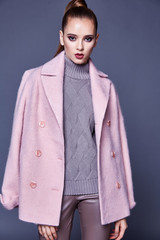 Woman wear business style clothing for office casual meeting outwear cashmere coat pink wool knitted sweater lather skinny pants fall collection casual formal for office beautiful face model glamour.