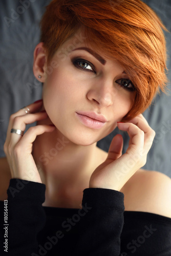 Portrait Of A Beautiful Young Red Haired Woman With Short Hair