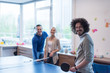 © .shock - startup business team playing ping pong tennis