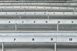 Old fashioned bleacher seats at a baseball park.