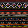 Embroidered ethnic seamless pattern. Aztec and tribal motifs. Striped ornament hand drawn. Print in the bohemian style.