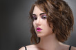 © ksi - Fashion beauty portrait of a girl with a bright make-up in lilac tones.