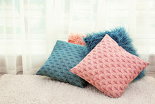 Colorful Pillows On Floor Indoors