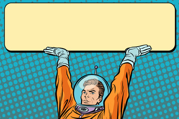 Wall Mural - astronaut holding a banner poster