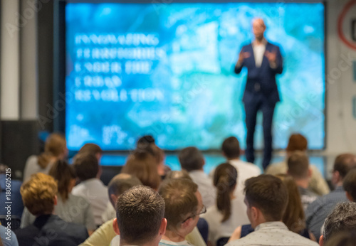 Photo  Audience listens to the lecturer at the conference hall