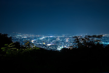 City night with lights from the view point on top of mountain Suthep , Chiang Mai, Thailand