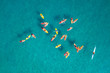 Large group of yellow Kayaks at calm water - Top down aerial view