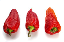 Red Shriveled Pepper On A Natural White Background