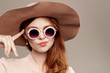 © SHOTPRIME STUDIO - woman in glasses and hat portrait