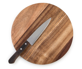 Wall Mural - Chef knife on a round cutting board made from acacia wood isolated on white background, top view