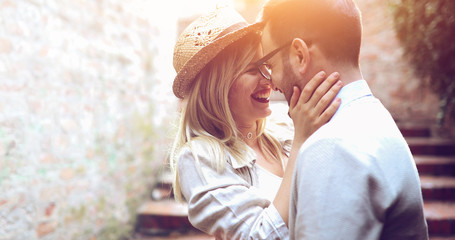 Wall Mural - Romantic couple dating in sunset