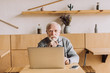 © LIGHTFIELD STUDIOS - senior man with laptop