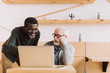 © LIGHTFIELD STUDIOS - senior men using laptop