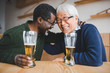 © LIGHTFIELD STUDIOS - senior friends drinking beer