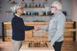 © LIGHTFIELD STUDIOS - senior men playing chess