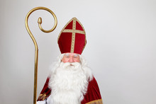 Saint Nicholas In His Red Costume On White