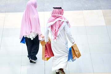 Wall Mural - Young muslim couple shopping